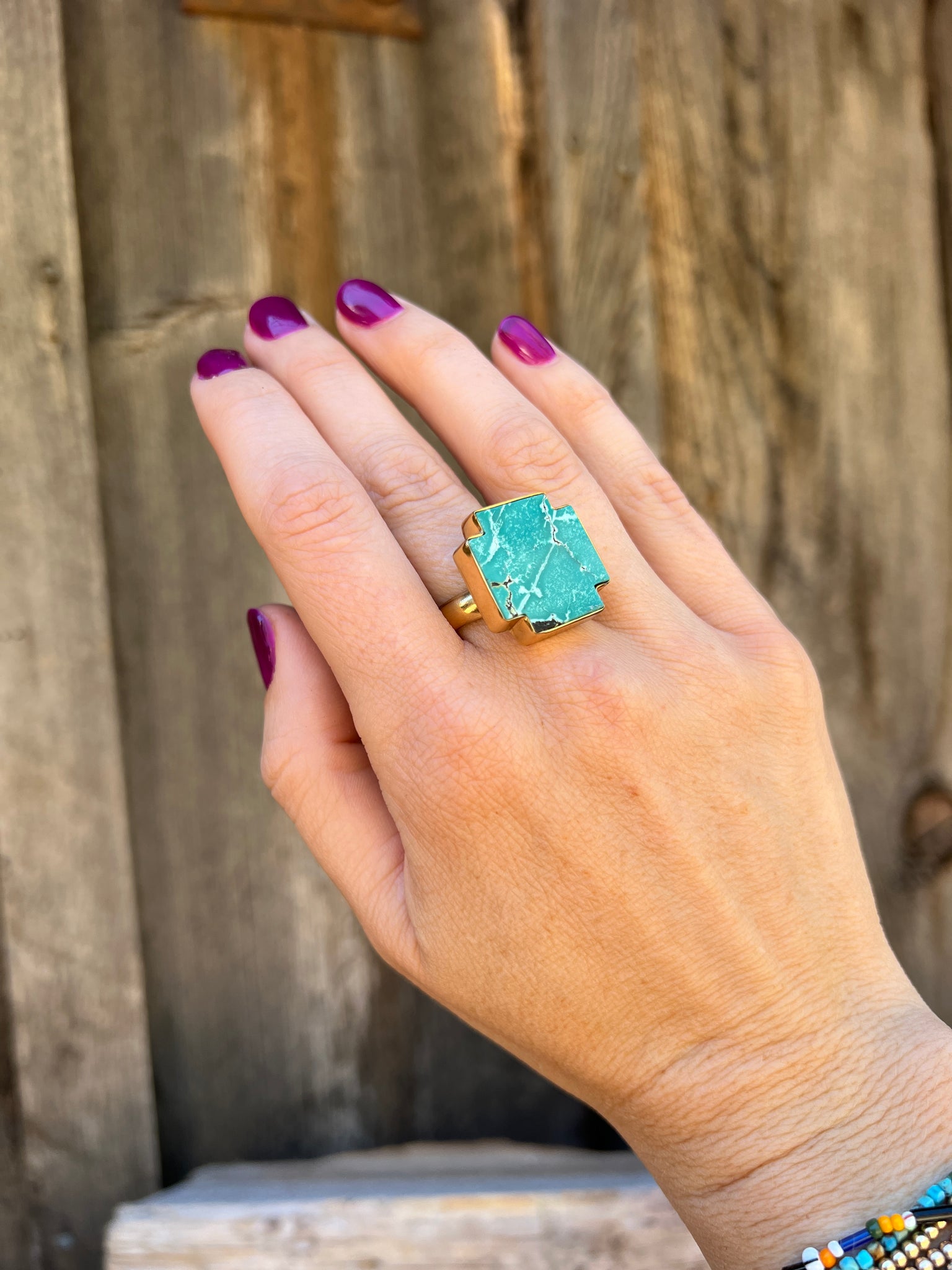 Turquoise alpine-cross ring in Gold Alchemia D12